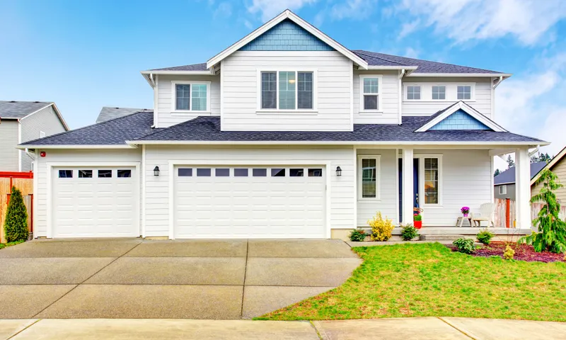 Luxury coastal home near Rehoboth Beach boardwalk at sunset